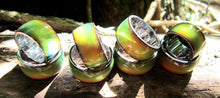 Load image into Gallery viewer, stainless steel band mood rings turning a green yellow color outside