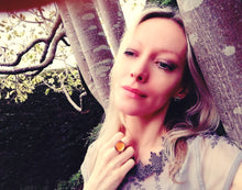 Load image into Gallery viewer, blonde model wearing a circular mood ring by a tree