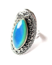 Load image into Gallery viewer, an adjustable mood ring turning a blue color