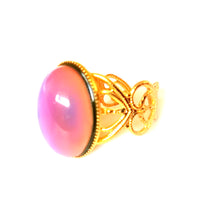 Load image into Gallery viewer, mood ring with a gold band with a pink mood