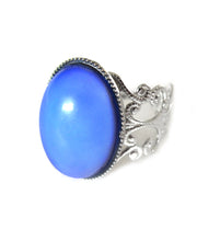 Load image into Gallery viewer, mood ring with silver band turning a blue color