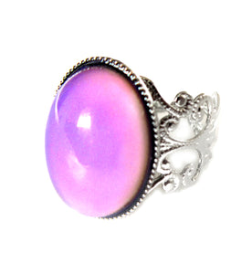 oval brass mood ring with pink mood color