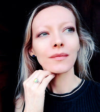 Load image into Gallery viewer, model wearing a sterling silver celtic mood ring