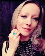 Load image into Gallery viewer, a model wearing a sterling silver mood ring by best mood rings
