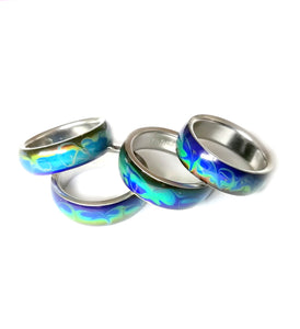 colorful swirly band mood rings with marble patterns in stainless steel