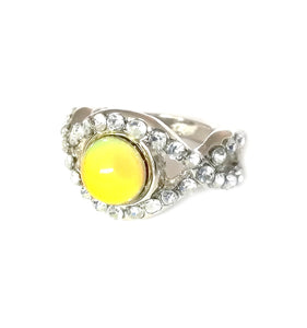 silver mood ring with pretty stones and a yellow mood color