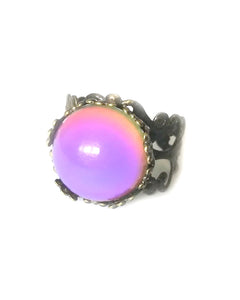 bronzed mood ring with adjustable band turning a pink mood color by best mood rings