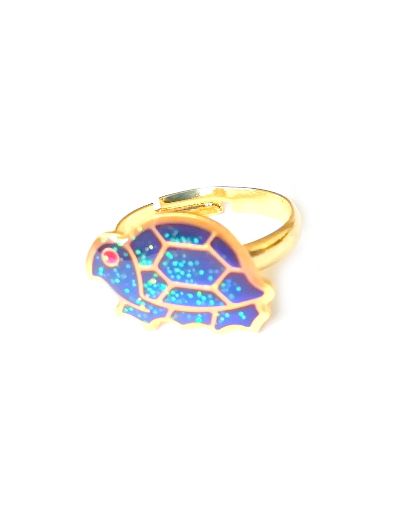 a gold colored child mood ring with a turtle shape
