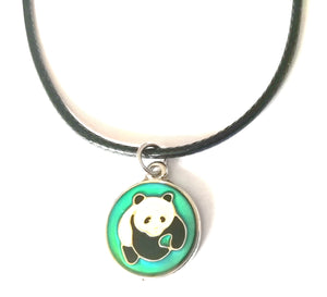 a circular mood pendant necklace with a panda design