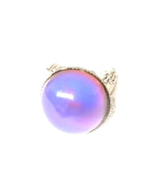 Load image into Gallery viewer, a circular mood ring showing a purple pink color mood by best mood rings
