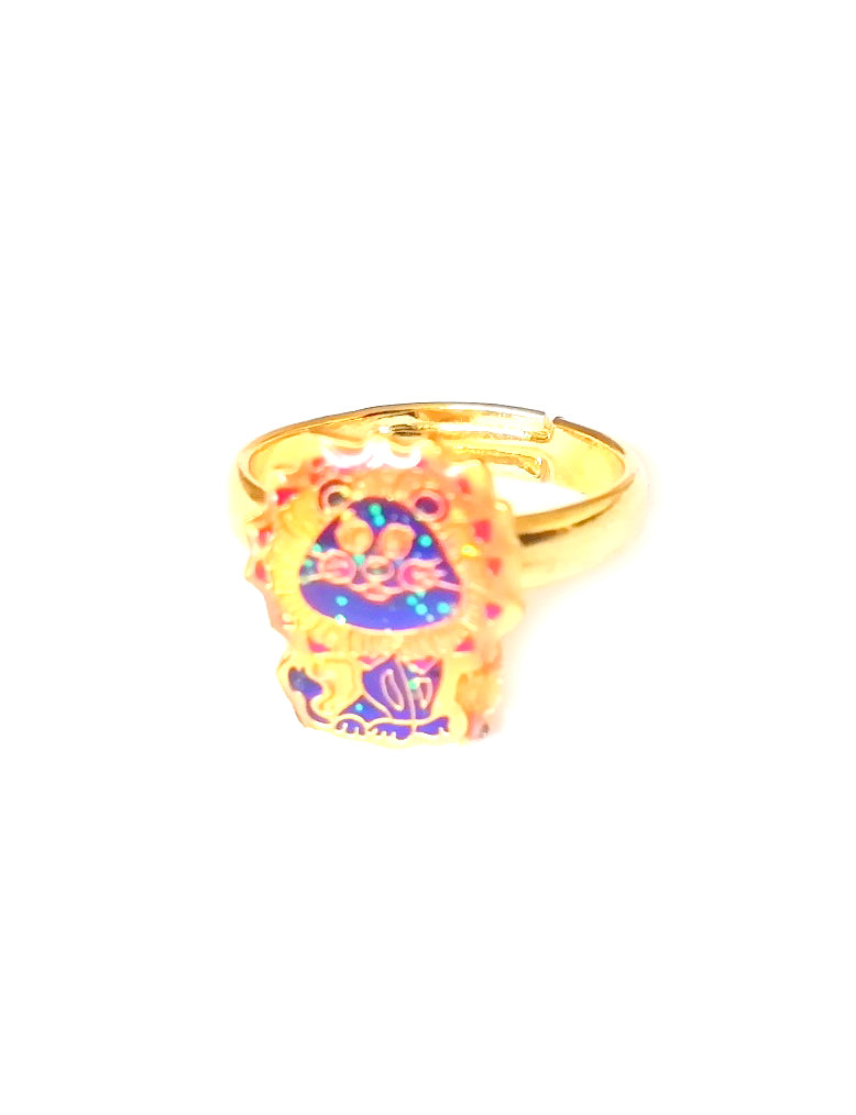a gold colored child mood ring with a lion shape and adjustable band