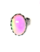 Load image into Gallery viewer, a mood ring changing color from pink mood meaning to green by best mood rings