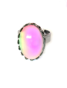 a mood ring changing color from pink mood meaning to green by best mood rings