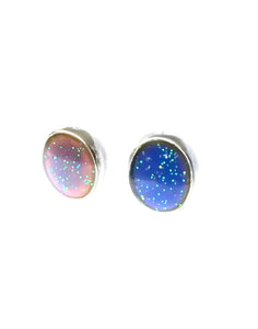 mood earrings with an oval shape one is pink mood color one is blue mood color