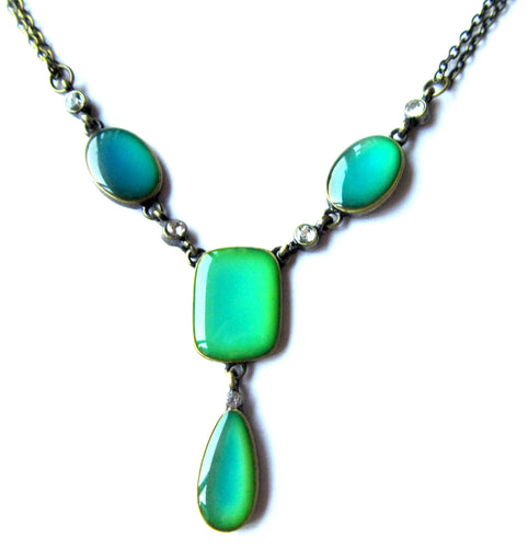 mood necklace with green colored moods