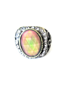 a mood ring with pretty stones around the mood stone