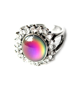 an antique style mood ring with beads around the sides