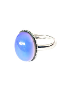 a mood ring turning a purple color mood