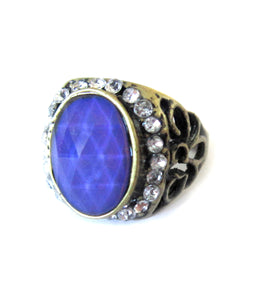 bronzed mood ring with a purple mood