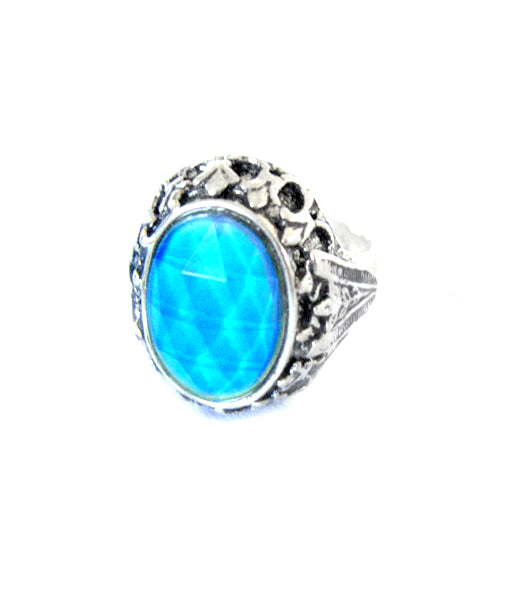 an adjustable mood ring turning a blue color