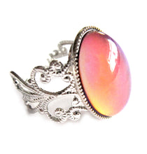 Load image into Gallery viewer, oval mood ring with orange mood meaning and silver shade brass band