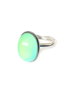 mood ring with an oval shape in a silver color with an adjustable band